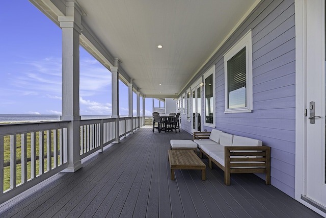 25603 Snowy Egret Dr, Galveston, TX 77554 - wooden deck with outdoor lounge area, a water view, and outdoor dining area