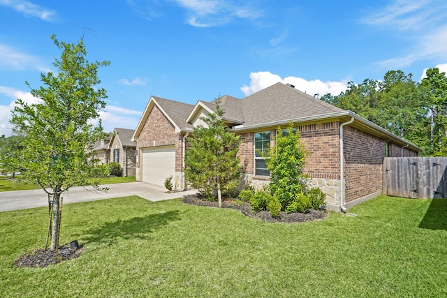 22078 Sun Haven Ln, Porter, TX 77365 - view of front of property with brick siding, concrete driveway, roof with shingles, an attached garage, and stone siding