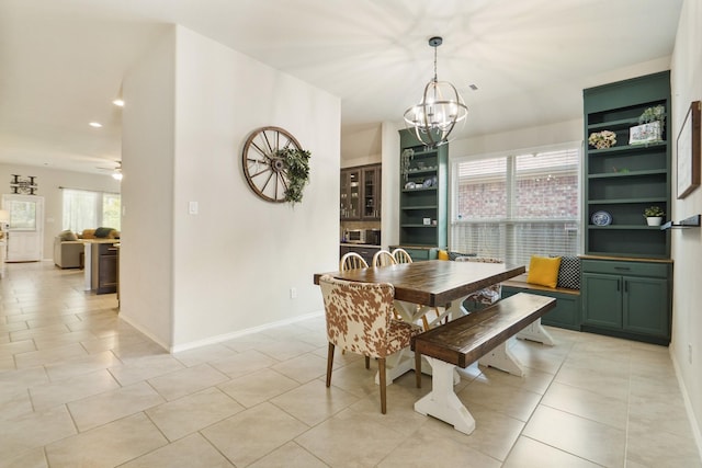 22078 Sun Haven Ln, Porter, TX 77365 - dining space with a chandelier, light tile patterned flooring, baseboards, ceiling fan, and recessed lighting