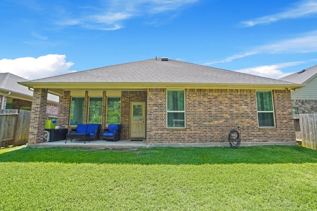 22078 Sun Haven Ln, Porter, TX 77365 - back of house featuring a patio, brick siding, and roof with shingles