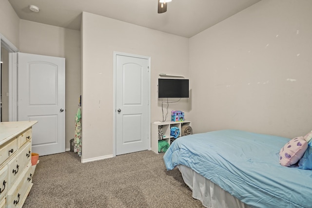 22078 Sun Haven Ln, Porter, TX 77365 - carpeted bedroom with ceiling fan and baseboards