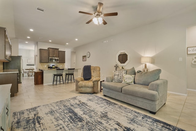 22078 Sun Haven Ln, Porter, TX 77365 - living area featuring ceiling fan, recessed lighting, light tile patterned floors, and baseboards