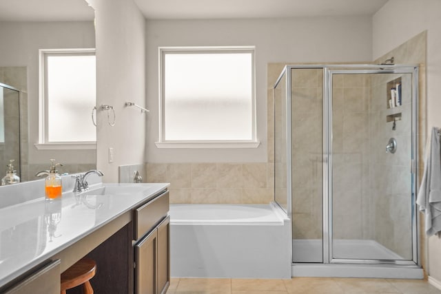 22078 Sun Haven Ln, Porter, TX 77365 - bathroom featuring tile patterned flooring, healthy amount of natural light, a shower stall, and vanity