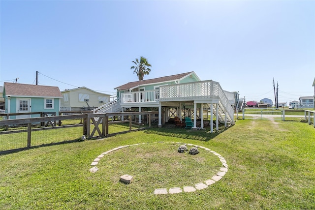 1010 Fort Velasco Dr, Surfside Beach, TX 77541 - back of house featuring stairs and a wooden deck