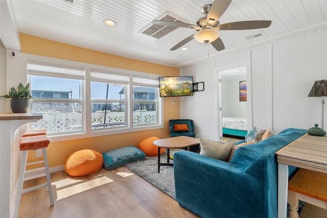 1010 Fort Velasco Dr, Surfside Beach, TX 77541 - living area with wood finished floors, wood ceiling, a ceiling fan, recessed lighting, and baseboards