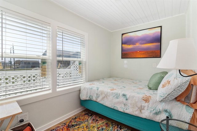 1010 Fort Velasco Dr, Surfside Beach, TX 77541 - bedroom with baseboards and wood ceiling