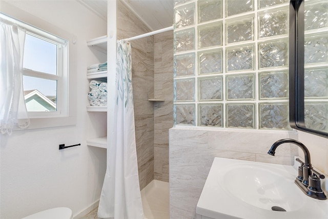 1010 Fort Velasco Dr, Surfside Beach, TX 77541 - bathroom with walk in shower, toilet, and vanity