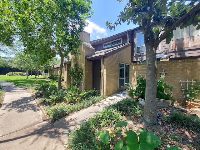 2356 Gemini St, Houston, TX 77058 - view of front of home featuring brick siding
