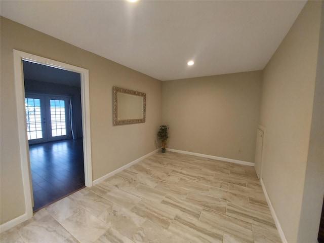 2356 Gemini St, Houston, TX 77058 - empty room with french doors, baseboards, and recessed lighting