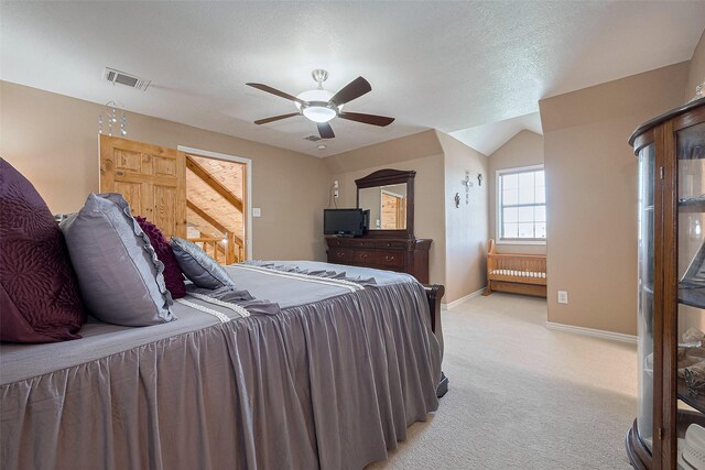 16325 Senkel Rd, East Bernard, TX 77435 - bedroom featuring light carpet, baseboards, and a ceiling fan