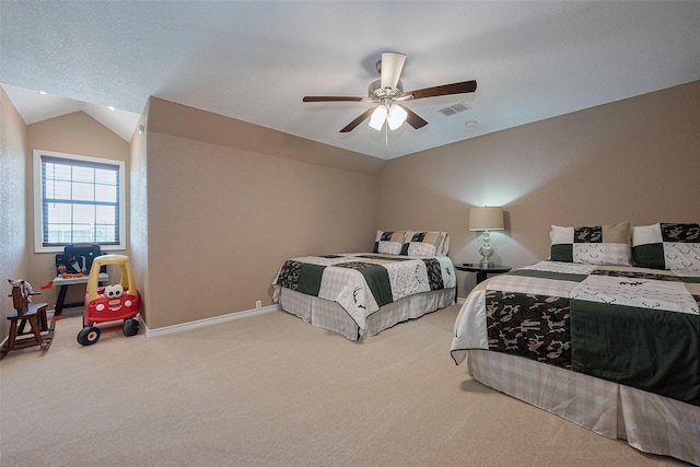 16325 Senkel Rd, East Bernard, TX 77435 - carpeted bedroom with vaulted ceiling, baseboards, and a ceiling fan