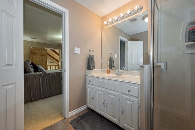 16325 Senkel Rd, East Bernard, TX 77435 - ensuite bathroom featuring vanity and tile patterned floors