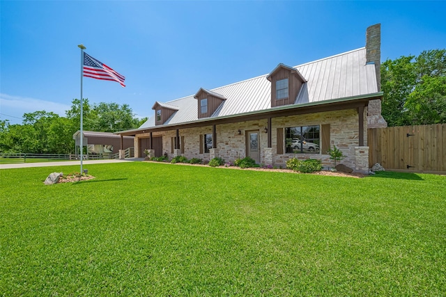 16325 Senkel Rd, East Bernard, TX 77435 - view of front of house with driveway, a garage, stone siding, metal roof, and a chimney