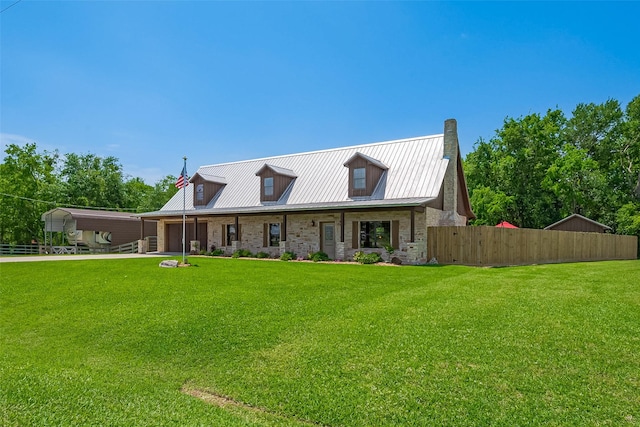 16325 Senkel Rd, East Bernard, TX 77435 - view of front facade with a garage, driveway, and metal roof