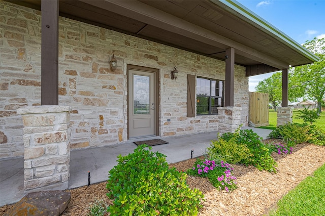 16325 Senkel Rd, East Bernard, TX 77435 - view of exterior entry with stone siding and covered porch