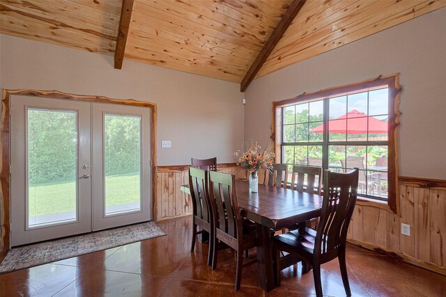 16325 Senkel Rd, East Bernard, TX 77435 - dining room with a wainscoted wall, french doors, wood walls, wood ceiling, and tile patterned floors