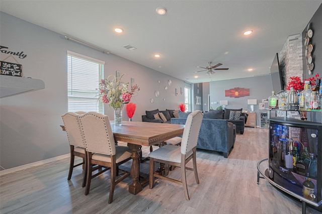 10027 Yanet Grove Ln, Houston, TX 77044 - dining room featuring light wood-style flooring, ceiling fan, and recessed lighting