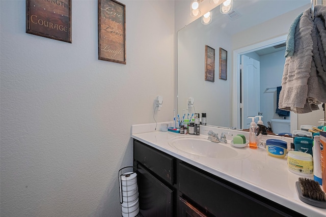 10027 Yanet Grove Ln, Houston, TX 77044 - bathroom with vanity and toilet