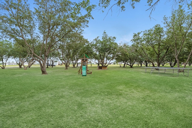 4439 W Bayshore Rd, Anahuac, TX 77514 - surrounding community with a lawn