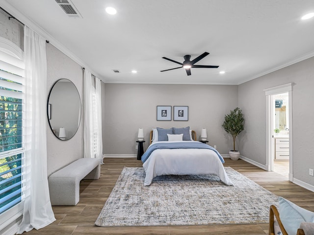 20647 Laurel Lock Dr, Katy, TX 77450 - bedroom with recessed lighting, ornamental molding, wood finished floors, baseboards, and ensuite bathroom