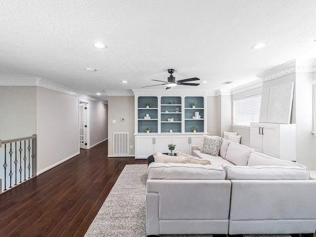 20647 Laurel Lock Dr, Katy, TX 77450 - living area with crown molding, a ceiling fan, wood finished floors, baseboards, and recessed lighting