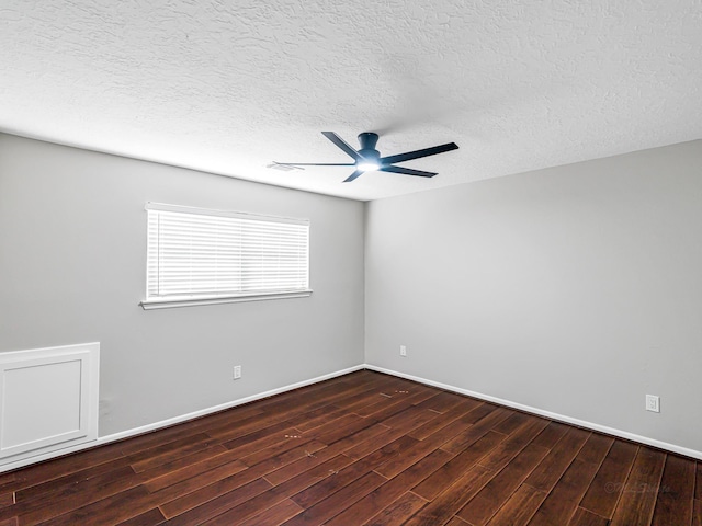 20647 Laurel Lock Dr, Katy, TX 77450 - empty room with ceiling fan, wood finished floors, baseboards, and a textured ceiling