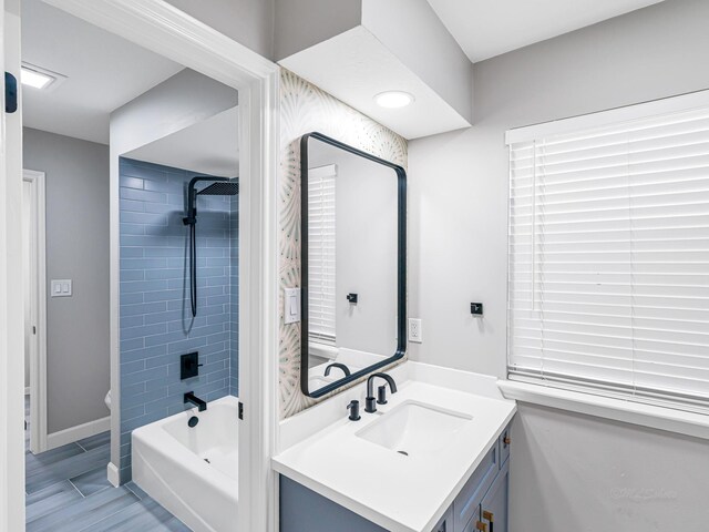 20647 Laurel Lock Dr, Katy, TX 77450 - bathroom with vanity,  shower combination, and baseboards