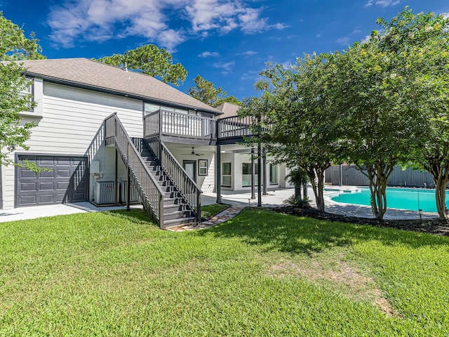 20647 Laurel Lock Dr, Katy, TX 77450 - back of house with a deck, stairs, a ceiling fan, and roof with shingles