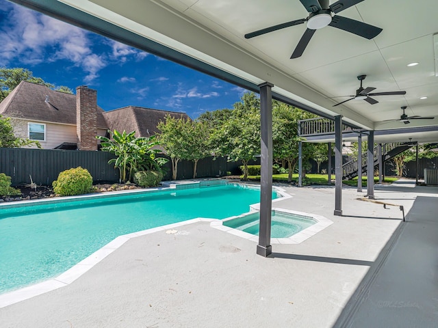 20647 Laurel Lock Dr, Katy, TX 77450 - view of pool with a fenced backyard, ceiling fan, a patio area, and a pool with connected hot tub