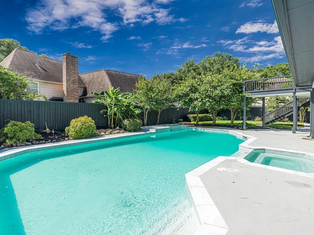 20647 Laurel Lock Dr, Katy, TX 77450 - view of swimming pool featuring a fenced backyard, an in-ground hot tub, and stairs