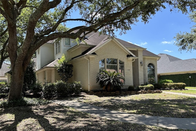 2331 Scottsdale Ct, League City, TX 77573 - view of front of property featuring brick siding and roof with shingles