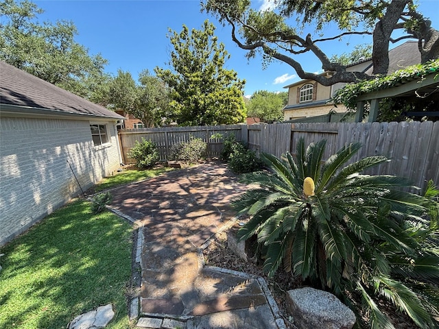 2331 Scottsdale Ct, League City, TX 77573 - fenced backyard featuring a patio area