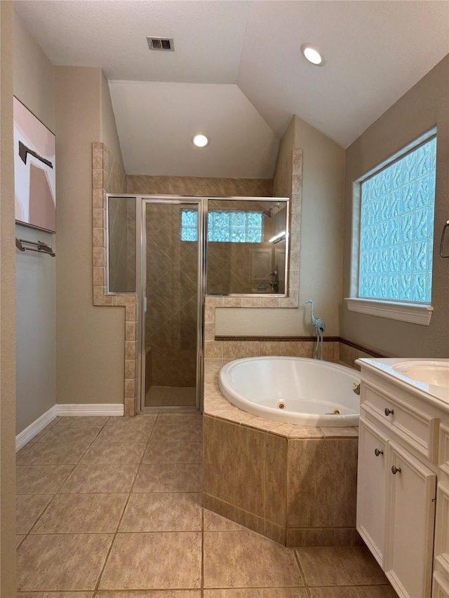2331 Scottsdale Ct, League City, TX 77573 - bathroom with a shower stall, a whirlpool tub, vanity, tile patterned flooring, and vaulted ceiling