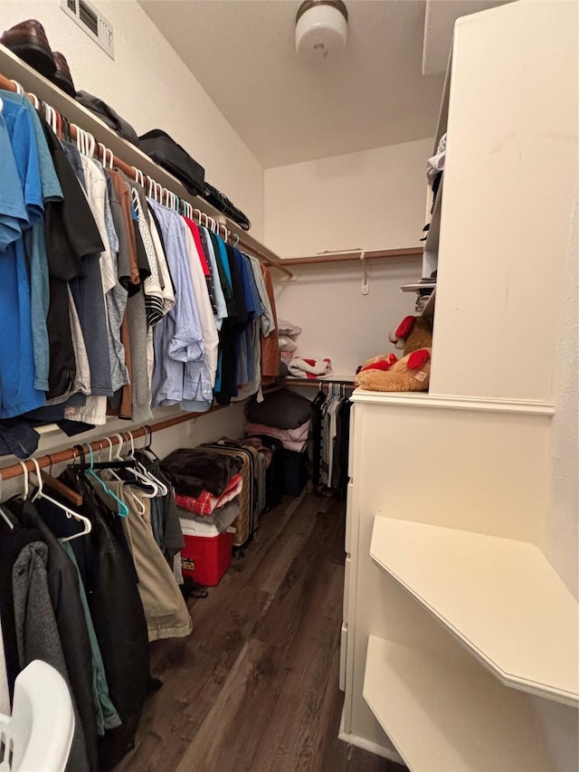 2331 Scottsdale Ct, League City, TX 77573 - walk in closet featuring wood finished floors