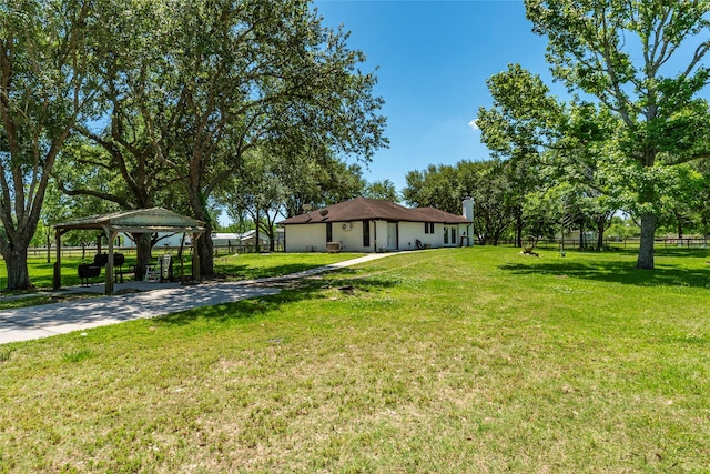 15329 Cedar St, Santa Fe, TX 77517 - view of yard featuring a gazebo, a detached carport, and concrete driveway