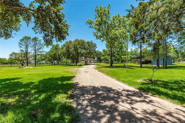 15329 Cedar St, Santa Fe, TX 77517 - view of community with a lawn