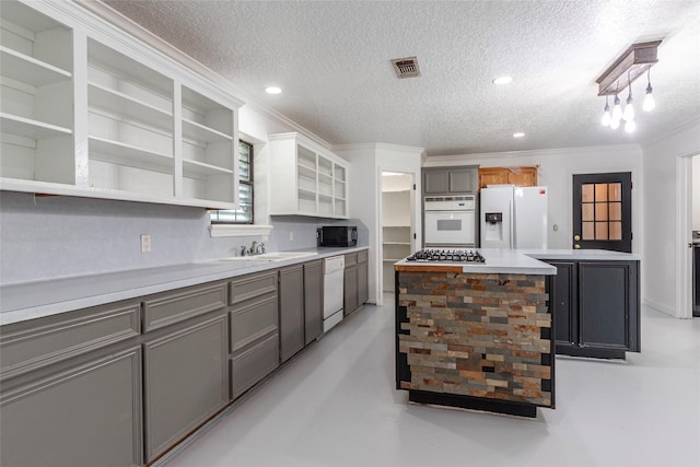 15329 Cedar St, Santa Fe, TX 77517 - kitchen with white appliances, open shelves, a sink, a kitchen island, and finished concrete flooring