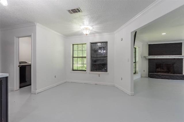 15329 Cedar St, Santa Fe, TX 77517 - unfurnished living room with a textured ceiling, finished concrete flooring, a fireplace, crown molding, and baseboards