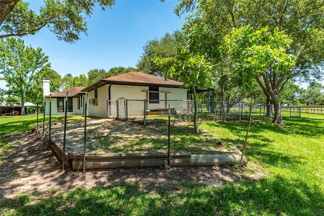 15329 Cedar St, Santa Fe, TX 77517 - back of house with a chimney