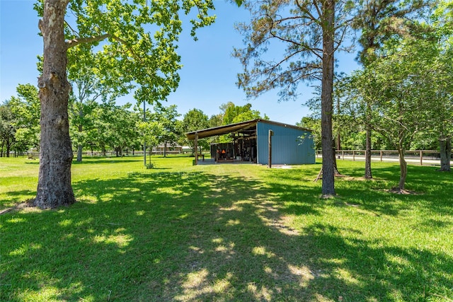 15329 Cedar St, Santa Fe, TX 77517 - view of yard featuring an outbuilding