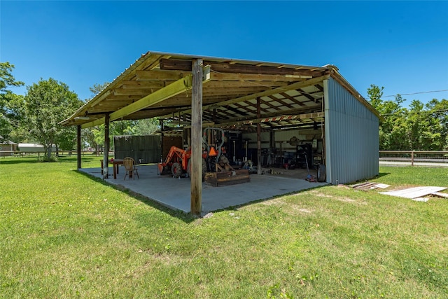 15329 Cedar St, Santa Fe, TX 77517 - view of patio / terrace featuring an outbuilding