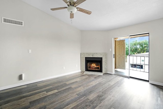 10101 S Gessner Rd Unit 811, Houston, TX 77071 - unfurnished living room with wood finished floors, a fireplace with flush hearth, baseboards, and ceiling fan