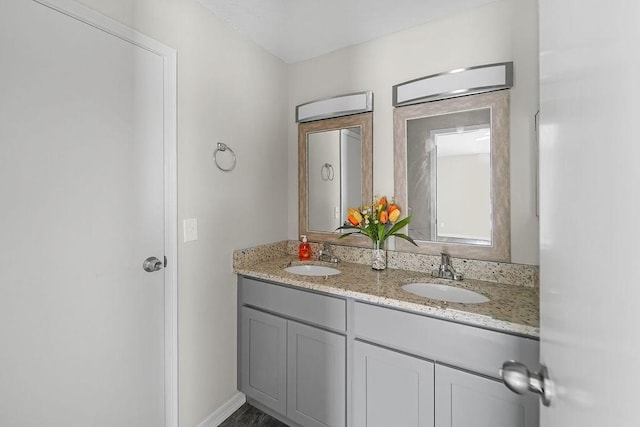 10101 S Gessner Rd Unit 811, Houston, TX 77071 - bathroom featuring double vanity