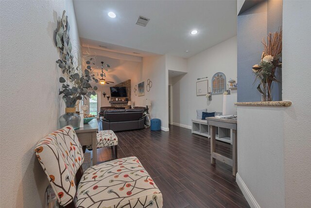 3207 Pheasant Trail Dr, Sugar Land, TX 77498 - living room with wood finished floors, baseboards, recessed lighting, and a textured wall