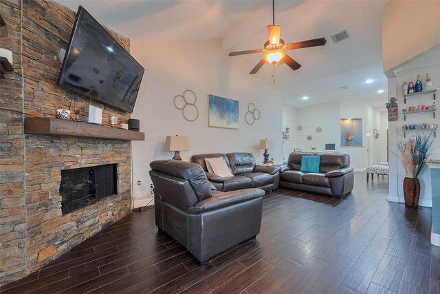 3207 Pheasant Trail Dr, Sugar Land, TX 77498 - living room featuring dark wood-style flooring, a stone fireplace, ceiling fan, and baseboards
