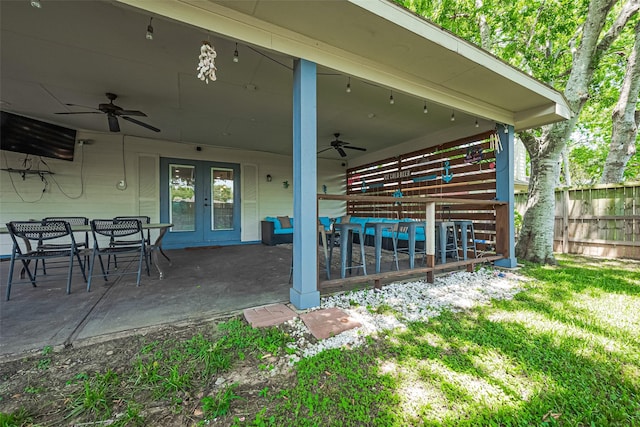 3207 Pheasant Trail Dr, Sugar Land, TX 77498 - view of patio / terrace featuring a ceiling fan, fence, french doors, and outdoor dining area
