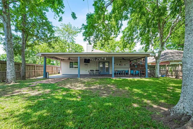 3207 Pheasant Trail Dr, Sugar Land, TX 77498 - rear view of house featuring ceiling fan, a chimney, a patio area, and french doors
