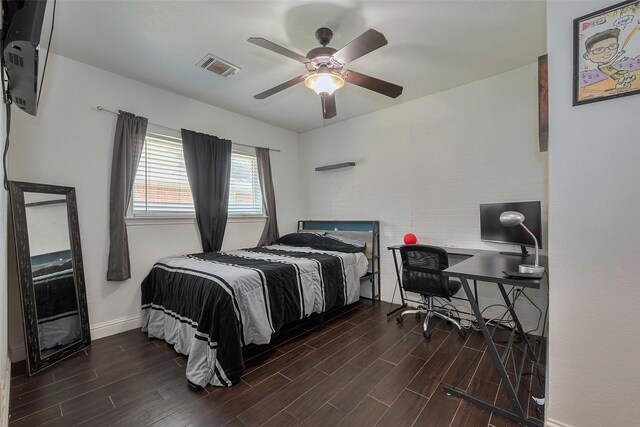 3207 Pheasant Trail Dr, Sugar Land, TX 77498 - bedroom with dark wood finished floors, baseboards, a desk, and ceiling fan