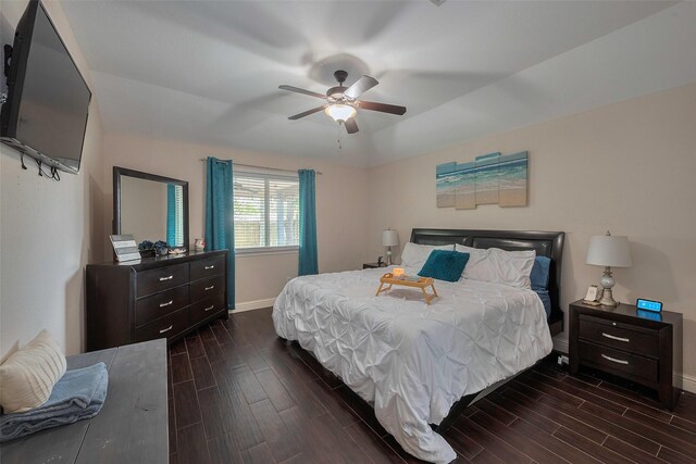 3207 Pheasant Trail Dr, Sugar Land, TX 77498 - bedroom featuring dark wood-style floors, baseboards, and a ceiling fan