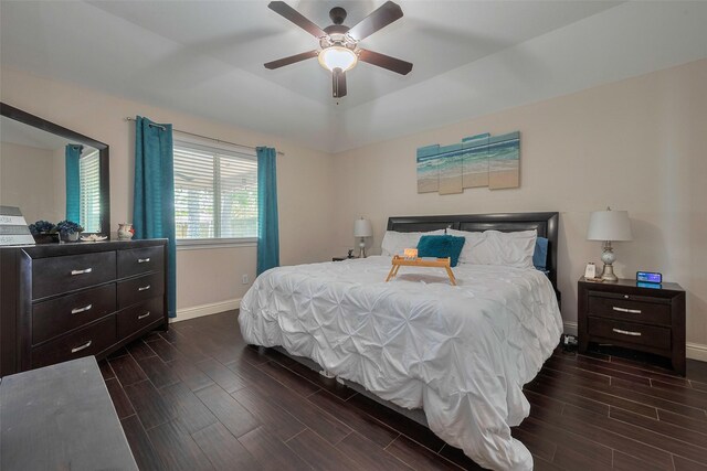 3207 Pheasant Trail Dr, Sugar Land, TX 77498 - bedroom with baseboards, wood finish floors, and a ceiling fan